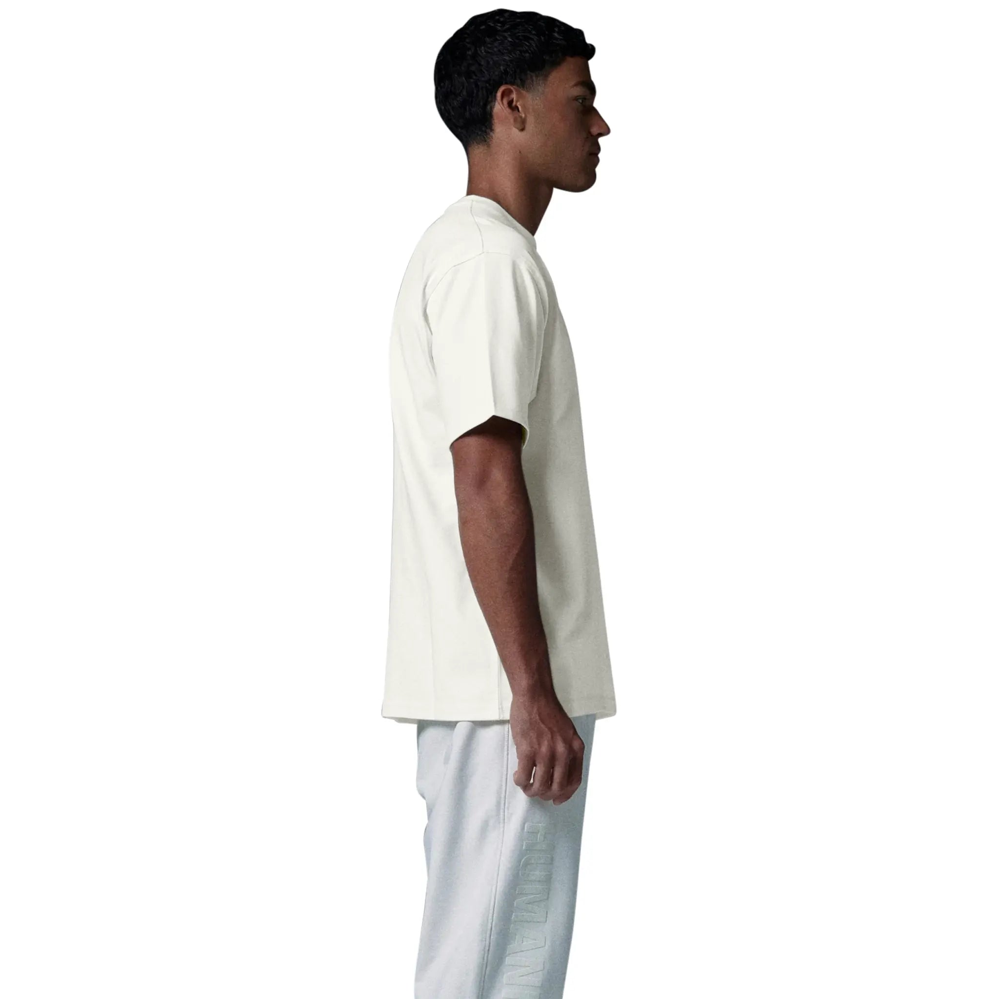 Model side view of Human Race Made Bone White T Shirt